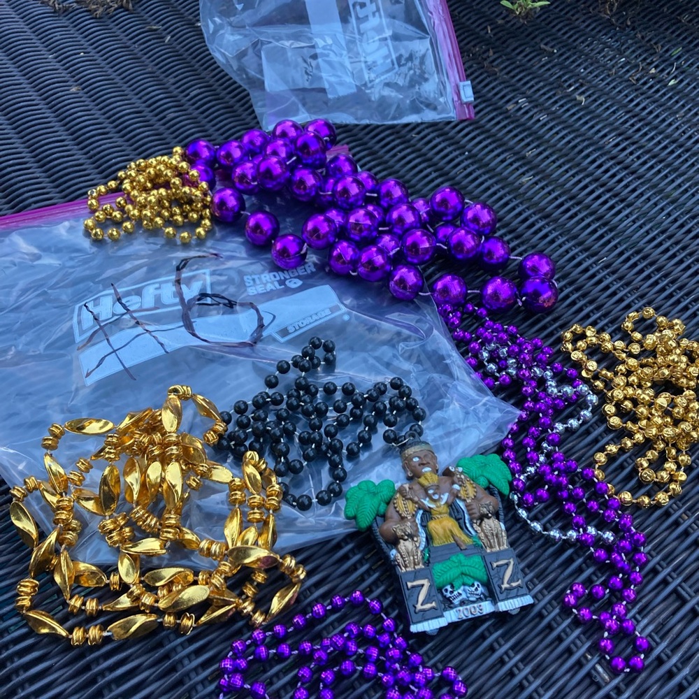 Vintage Zulu Mardi Gras beads and pendant